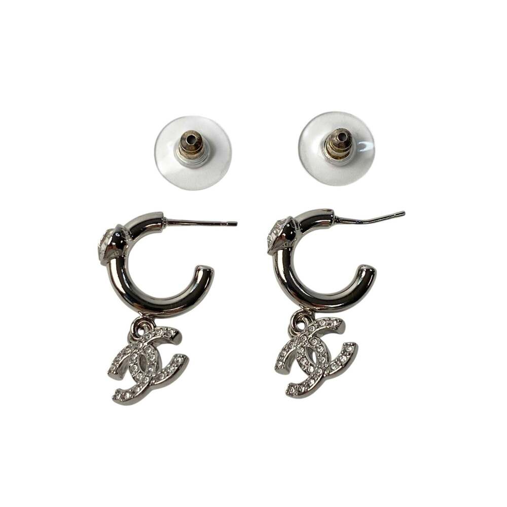 CHANEL Authentic Silver Logo Earrings - Picture 4 of 9